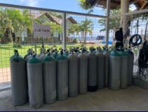 Rows of scuba cylinders at the diving center